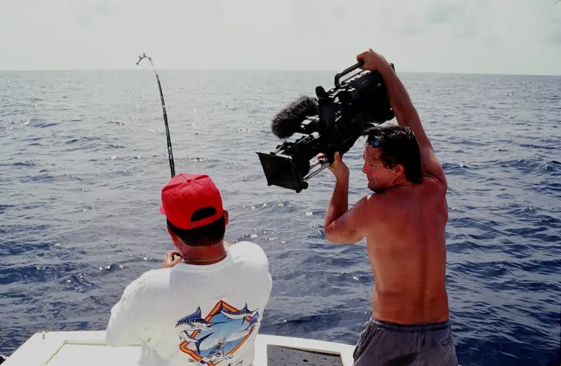 Michael Fowlkes filming an angler for the Inside Sportfishing archives